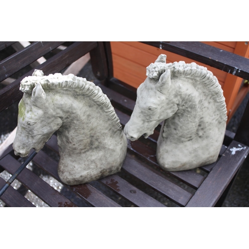 172 - Pair concrete horse head finials 10 1/2