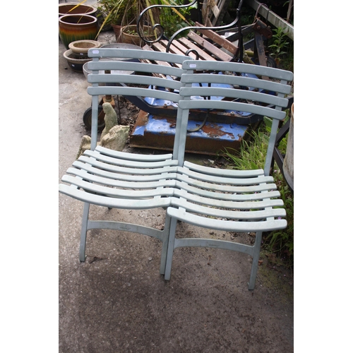 28 - Pair folding plastic garden chairs