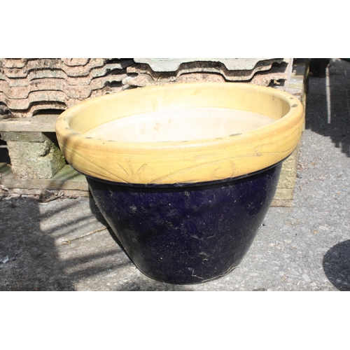 76 - Glazed blue & cream planter 10 1/2