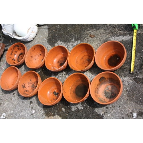 176 - 10 small circular planters 7 1/2