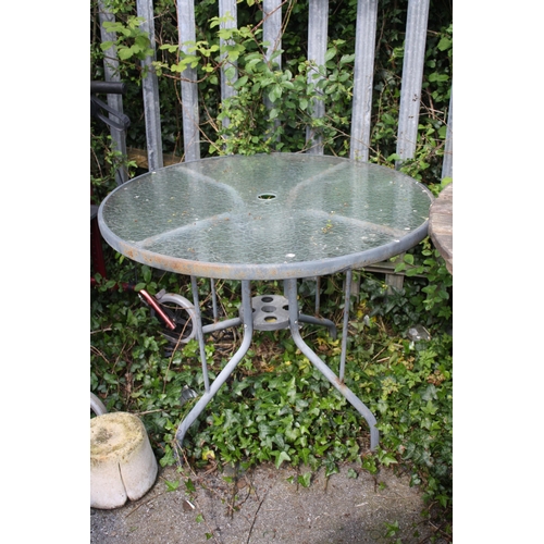 192 - Glass topped patio table 27 1/2