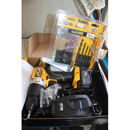 306 - As new JCB cordless drill & assorted drill bits