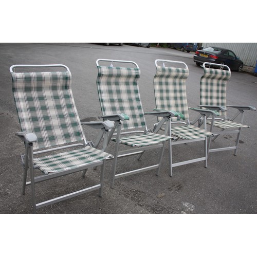 409 - Set 4 folding deck chairs