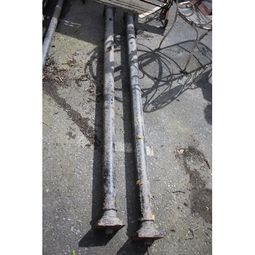 70 - Pair cast iron porch supports- 1 small piece missing on corner 86