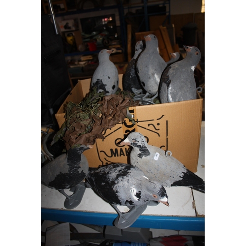 398 - Box plastic pigeons & camouflage net