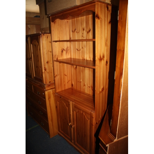 1795 - Pine bookcase with cupboard under 71 1/2