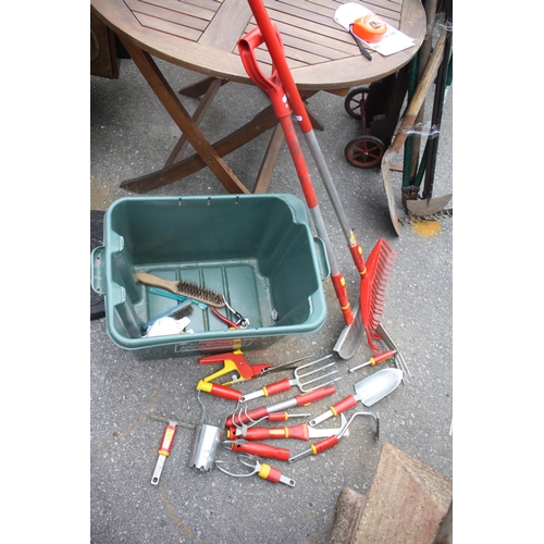 234 - Wolf long & short handled garden tool with numerous attachments