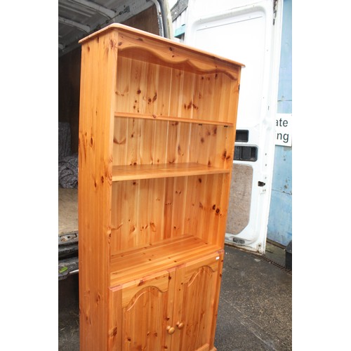 1795 - Pine bookcase with cupboard under 71 1/2