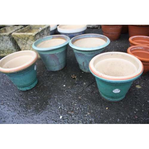 91 - 2 pairs turquoise planters tallest 8