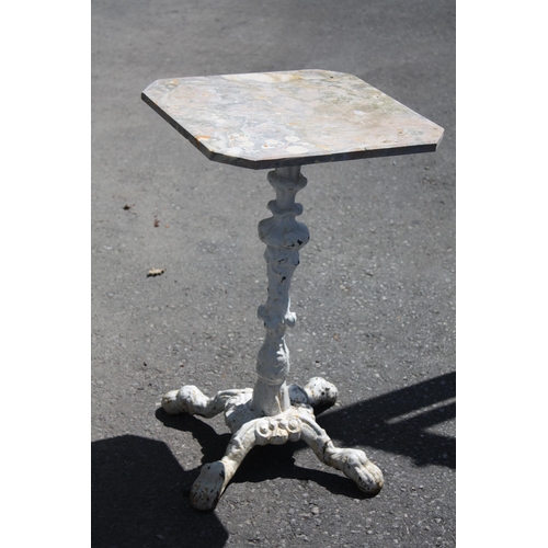 112 - Marble topped garden table on iron base 27