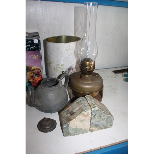 318 - Oil lamp, pewter teapot, bookends & screws