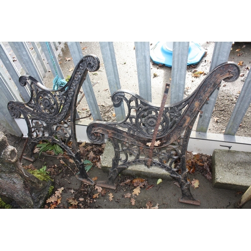 38 - Pair heavy iron bench ends 31