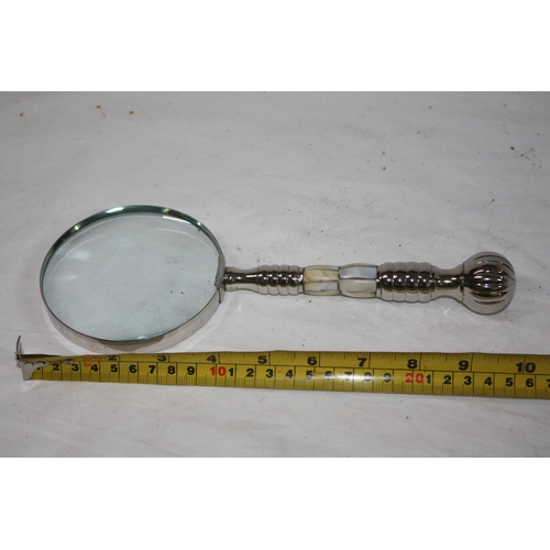 587 - Mother of pearl handled magnifying glass