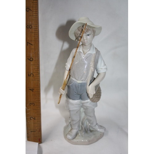 588 - Lladro fishing boy  8 1/2