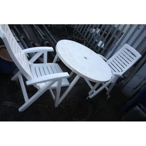 32 - White plastic patio table, 2 folding chairs & parasol base