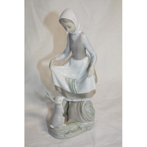 309 - Lladro figure lady with rabbit 9