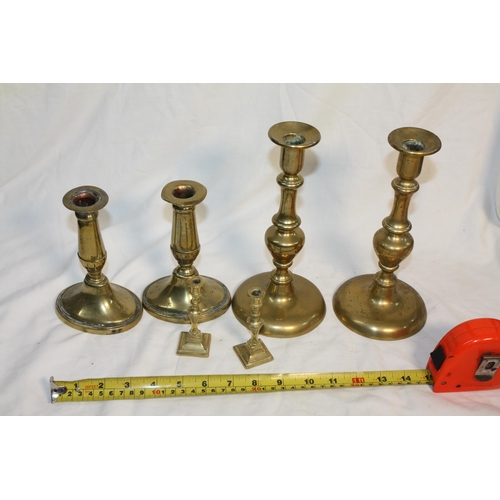 322 - 3 pairs brass candlesticks 9