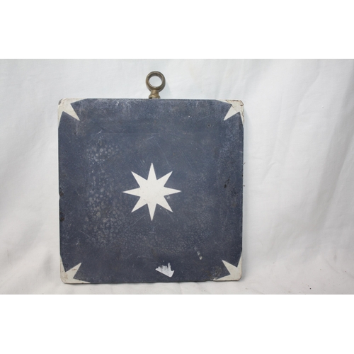 377 - Eastern star motif tile with brass hanger 9 1/4