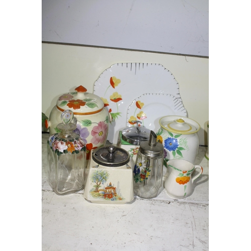 446 - Assorted patterned biscuit barrel, jar etc