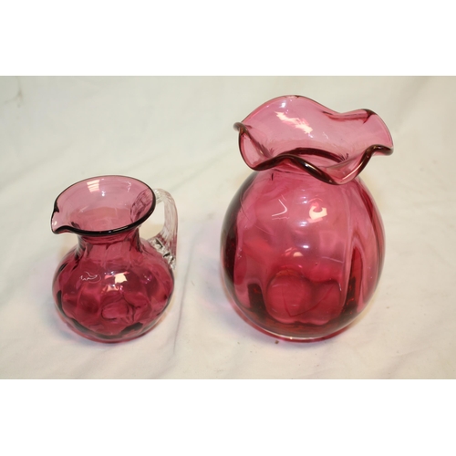 473 - 2 pieces cranberry glass 5 1/2