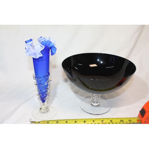 490 - Black glass bowl & blue vase