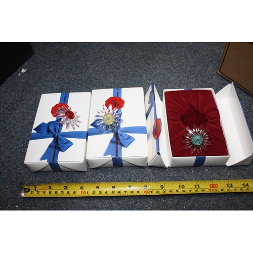 499 - 3 boxed Swarovski crystal flowerheads