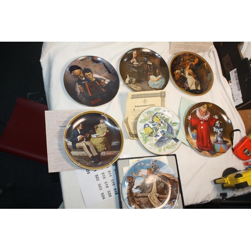 503 - 7 boxed collectors plates 9