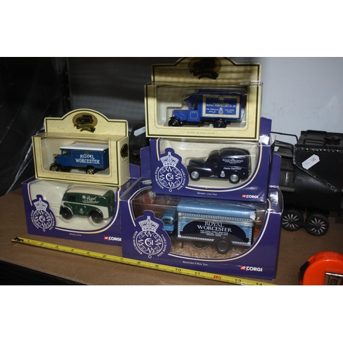 586 - 5 boxed Royal Worcester vehicles