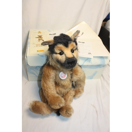 554 - Boxed Steiff German Shepherd with gilt button 17