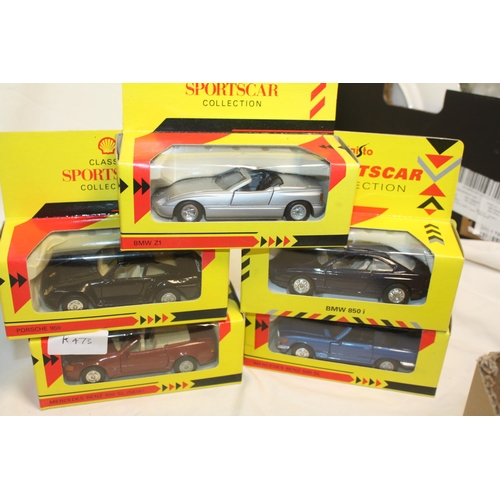 583 - 5 boxed model cars