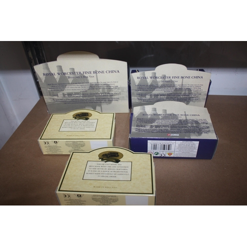 586 - 5 boxed Royal Worcester vehicles