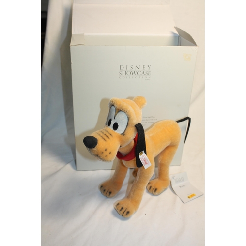 588 - Boxed Steiff Pluto with gilt button 11