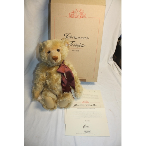 594 - Boxed Steiff Year 2000 growler teddy bear with gilt button 16