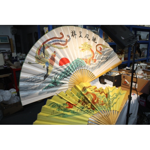 604 - 2 large Oriental design fans 36