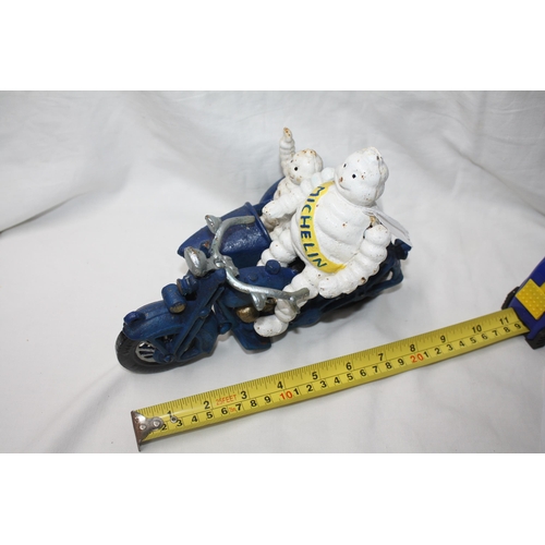 742 - 2 Michelin men on motorcycle & sidecar