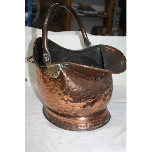 714 - Copper helmet coal scuttle dented