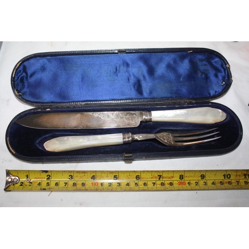 878 - Silver & mother of pearl boxed serving knife & fork