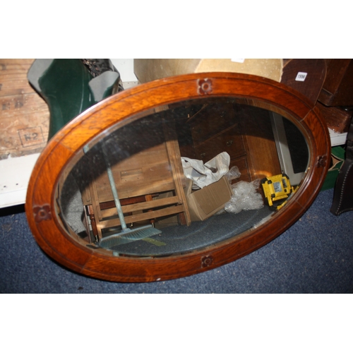 1466 - Oval oak framed mirror 29 1/2