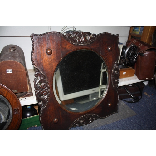 1467 - Decorative oak framed mirror 25