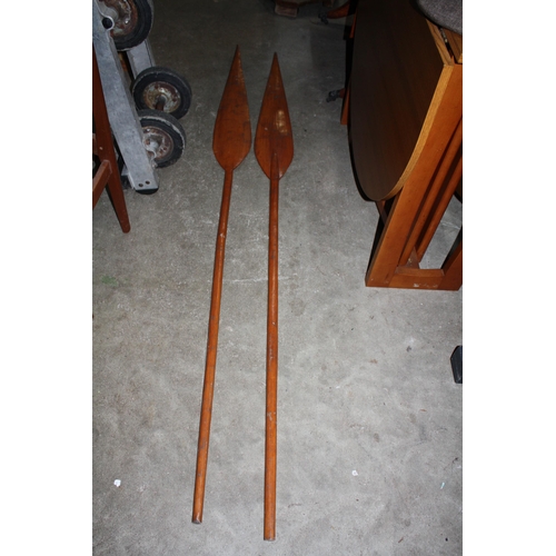 1542 - 2 long wooden spears 79