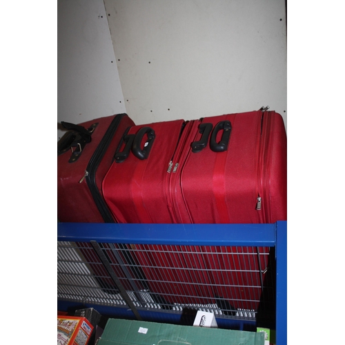 313 - 3 large suitcases