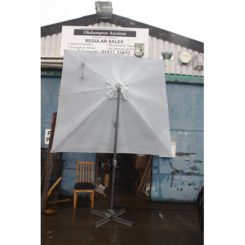 113 - As new large adjustable parasol