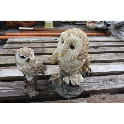 38 - 2 plastic owls 12