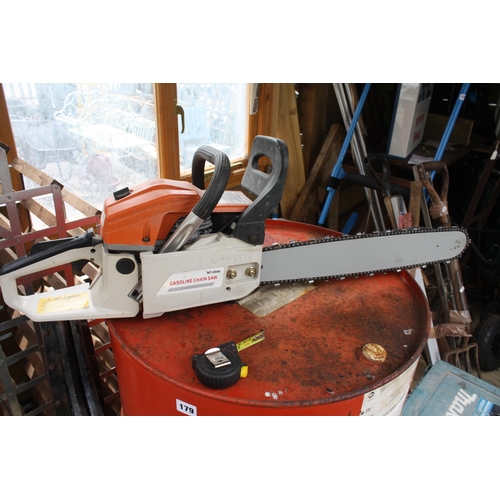 186 - Petrol chainsaw with new blade- looks unused excellent compression