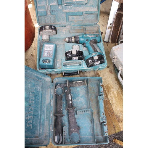 188 - Makita drill- batteries unchecked & 3 handles