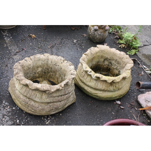 167 - Pair weathered concrete sack planters 10