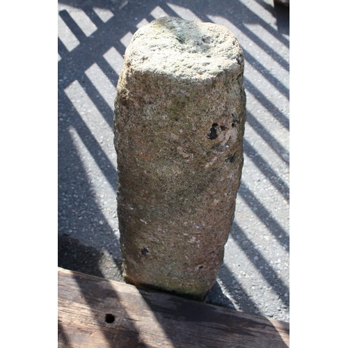 49 - Granite saddle stone 89cm height, 57cm diameter