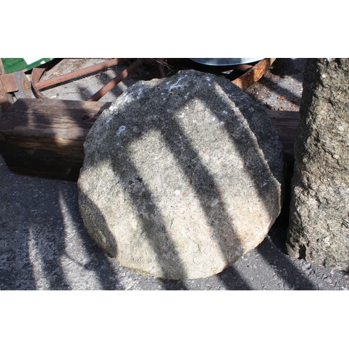 49 - Granite saddle stone 89cm height, 57cm diameter