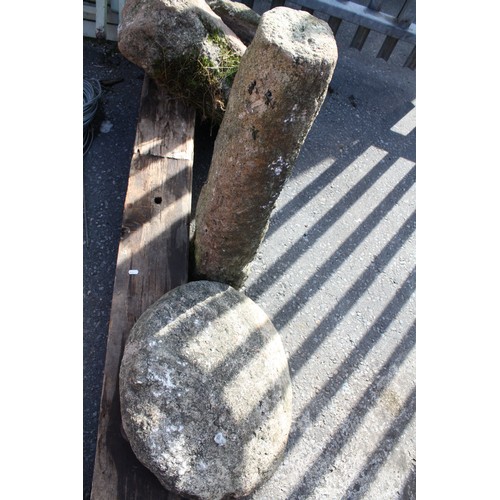 49 - Granite saddle stone 89cm height, 57cm diameter