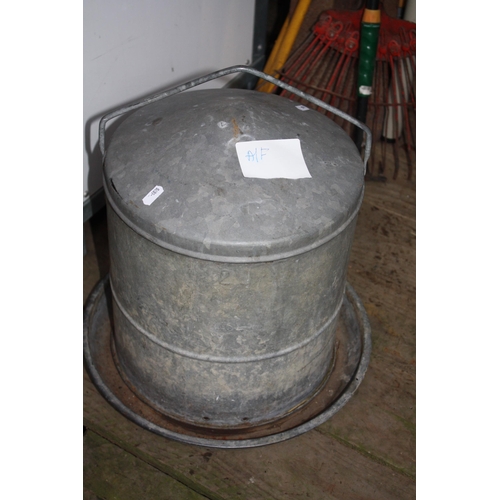 64 - Galvanised chicken feeder 16